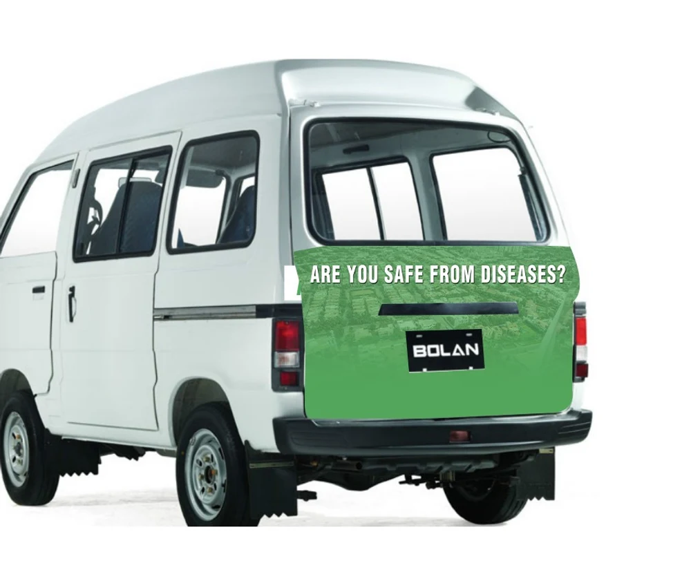 Suzuki Bolan fleet vehicle with branded rear wrap for Jaffer Environment and Hygiene