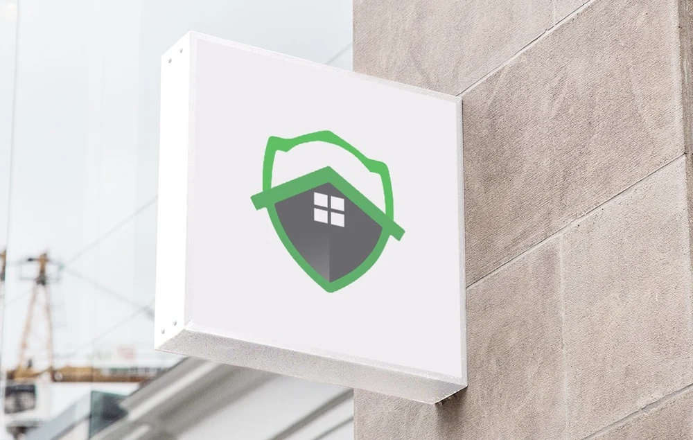 Exterior illuminated architectural light-box signage with JEH identity