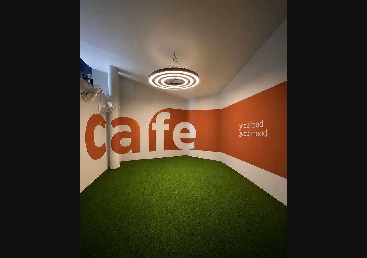 MidCity Cafe branded wall and menu treatment